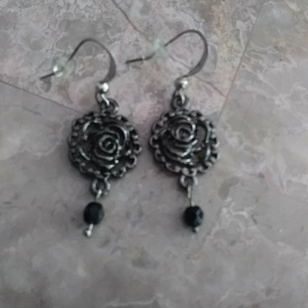 NWOT Handmade Metal flower earrings..3 Pairs 16.00...must buy 3 Pairs